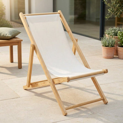 Fauteuil de jardin pliant en bois de pin, assise en toile beige, inclinaison visible