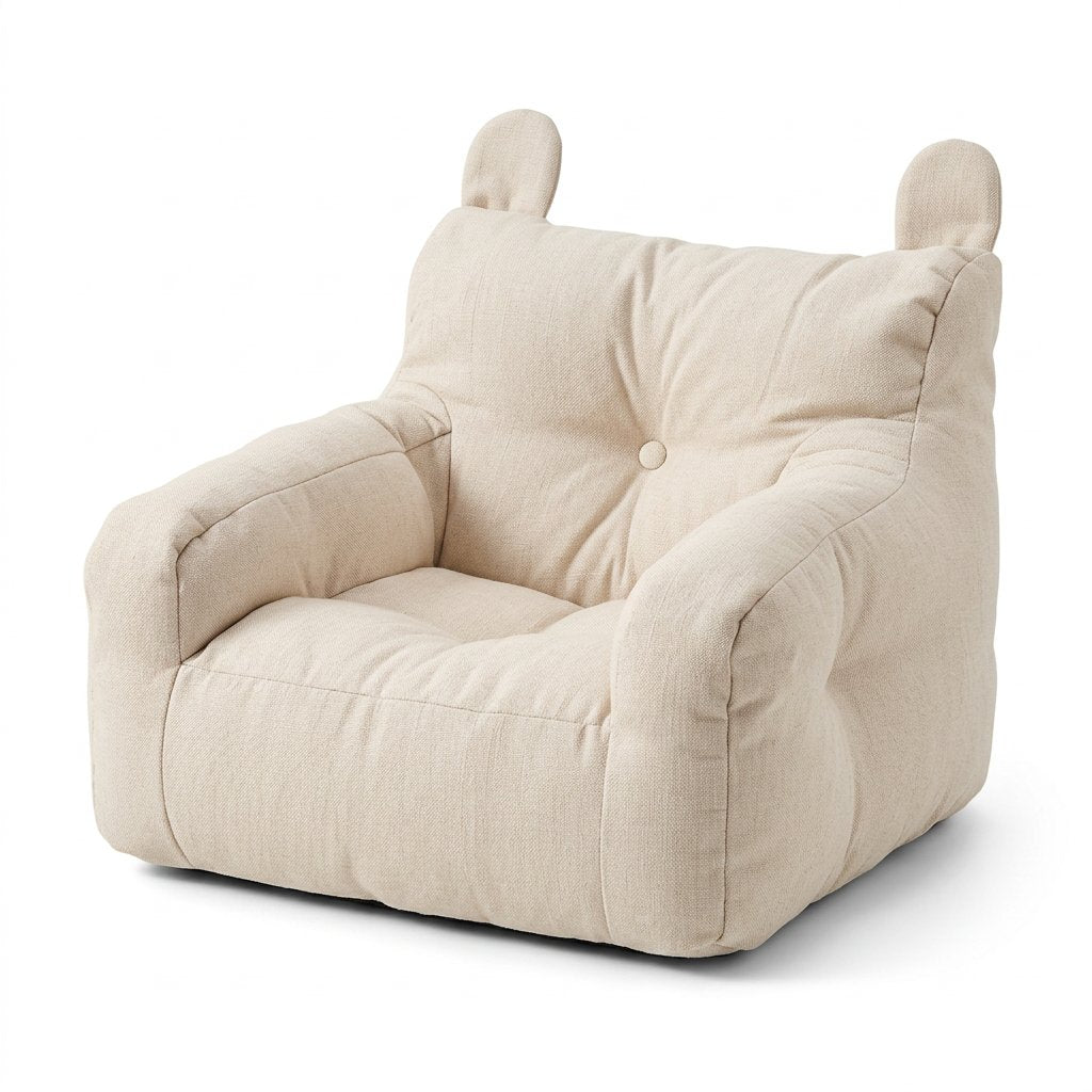 Fauteuil enfant en peluche beige clair, forme ours à oreilles et boutons.