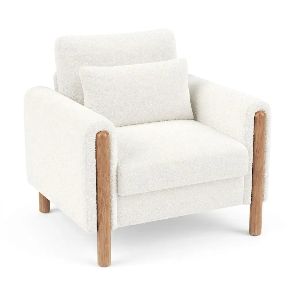 Fauteuil rembourré en tissu clair, accoudoirs droits et pieds en bois clairs