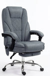 Fauteuil de bureau gris en tissu, dossier haut, repose-pieds escamotable, base chromée