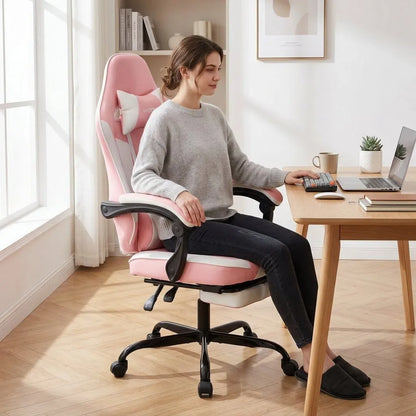Fauteuil de bureau rose ergonomique avec accoudoirs, coussins et repose-pieds.