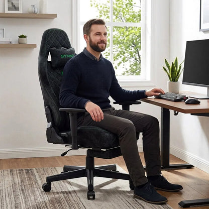 Fauteuil de bureau gaming noir, dossier haut capitonné, accoudoirs et base à roulettes