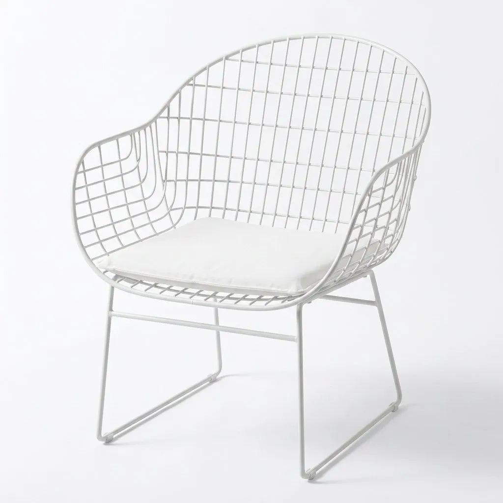 Fauteuil de jardin à bascule pliable, structure métal blanche, coussin blanc, vue 3/4.