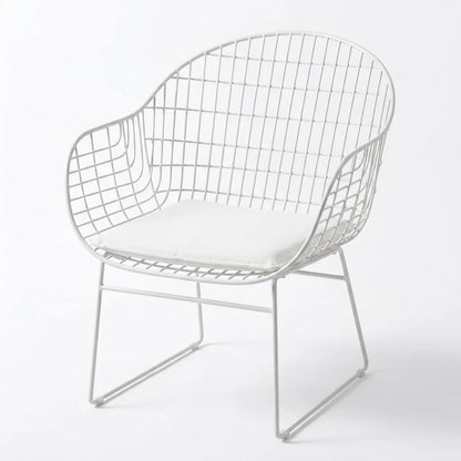 Fauteuil de jardin à bascule pliable, structure métal blanche, coussin blanc, vue 3/4.