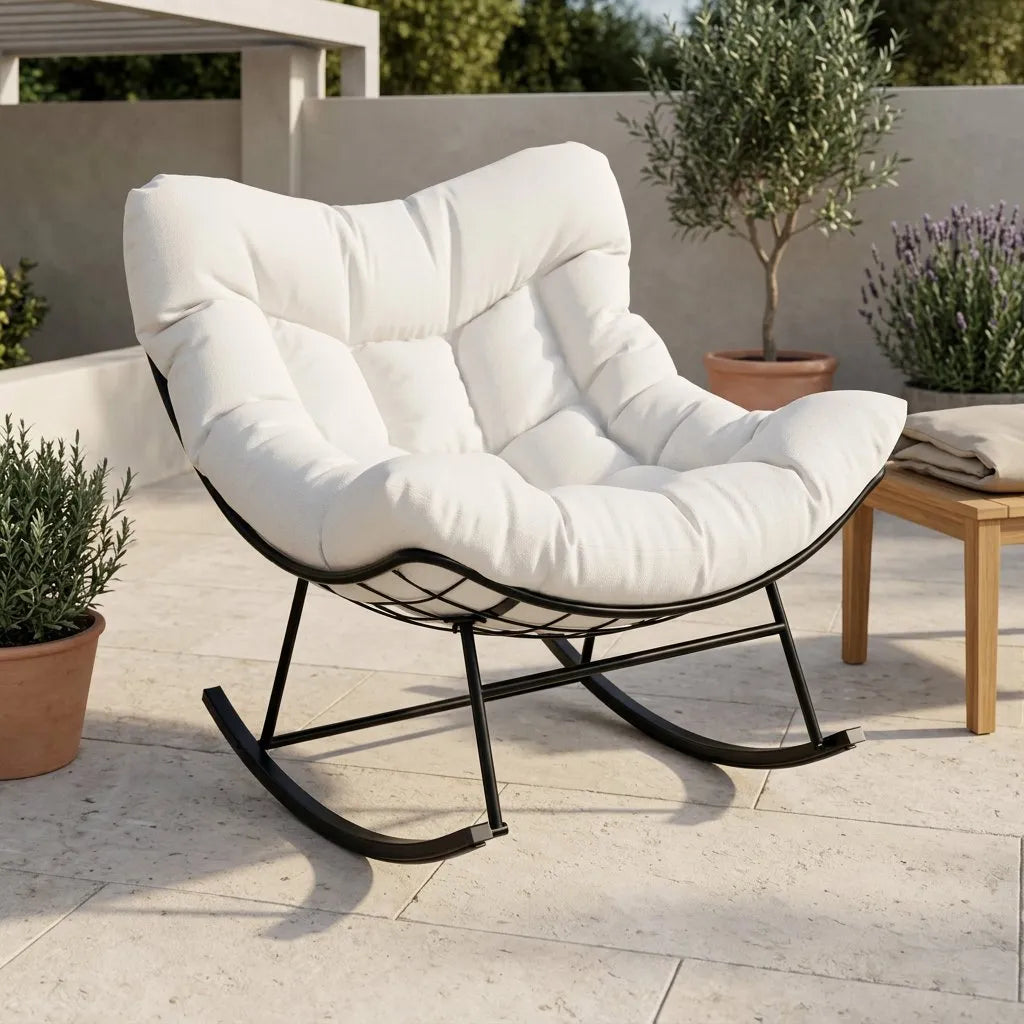 Fauteuil œuf XL blanc pivotant, coussin rembourré et repose-pieds, structure noire.