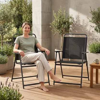 Fauteuil de jardin pliant noir en tissu maillé, accoudoirs, assise et dossier inclinés