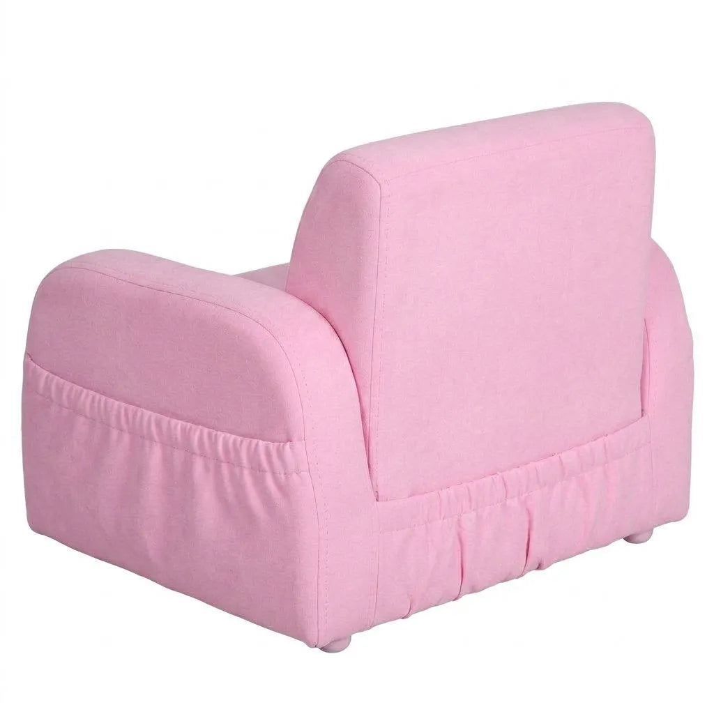 Fauteuil enfant rose, forme compacte avec grand dossier, rembourrage et accoudoirs