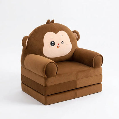 Fauteuil enfant marron en peluche, motif singe au visage, dossier arrondi, accoudoirs