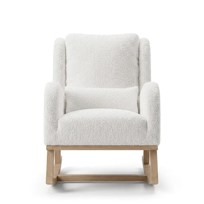 Fauteuil basculant en tissu blanc cassé, dossier haut, accoudoirs rembourrés, base en bois