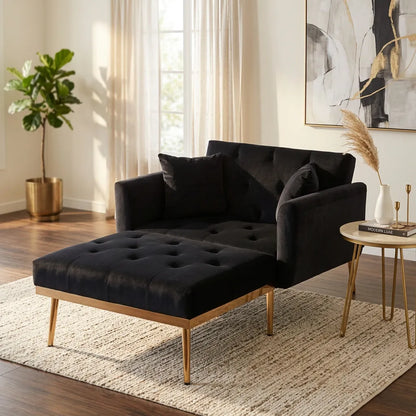 Fauteuil convertible en tissu bleu foncé, dossier capitonné et assise boutonnière, pieds bois.