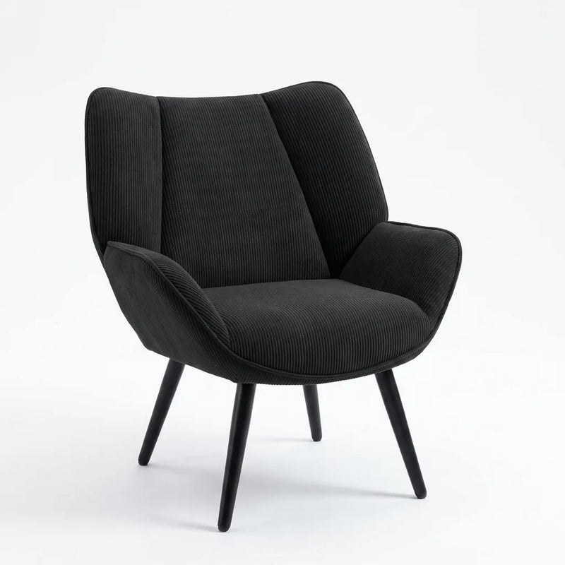 Fauteuil mid-century noir en velours côtelé, vue de face sur assise et accoudoirs.