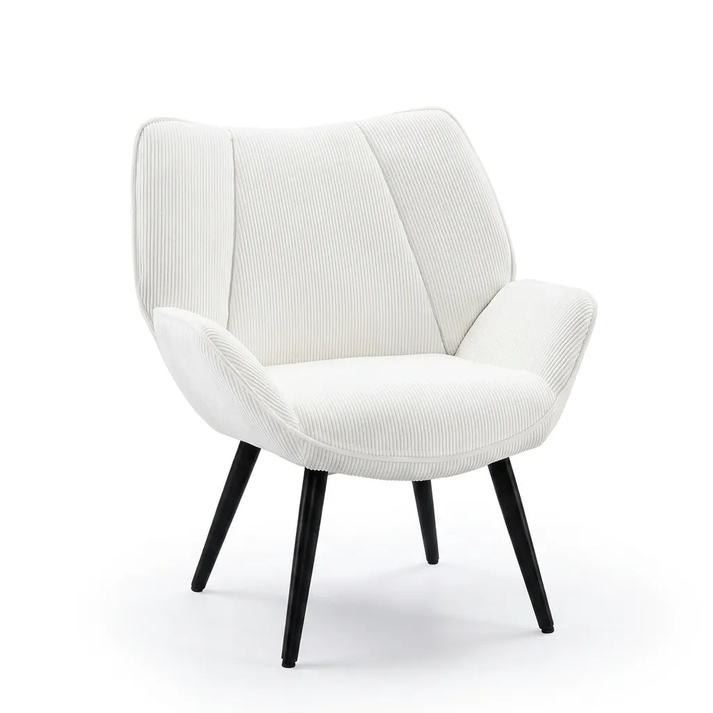 Fauteuil mid-century en velours côtelé blanc, accoudoirs courbes et pieds noirs.