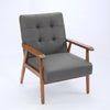 Fauteuil en cuir gris à dossier capitonné, accoudoirs, structure en noyer.