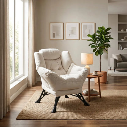 Fauteuil relax à revêtement clair, accoudoirs rembourrés et piètement noir en métal