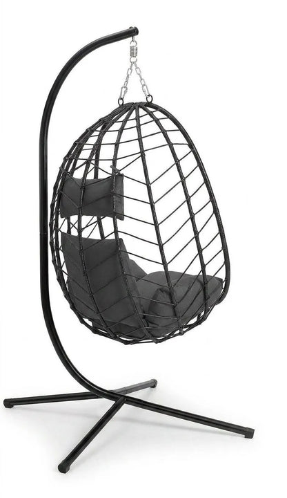Fauteuil suspendu noir sur pied en métal, structure en treillis et coussins