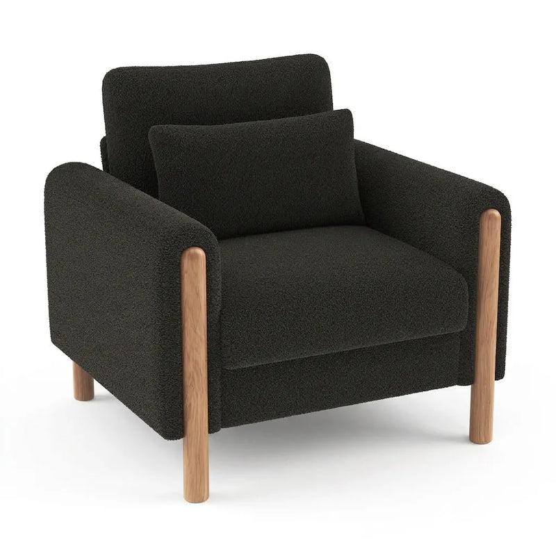 Fauteuil rembourré en tissu sombre, accoudoirs droits et pieds en bois clairs